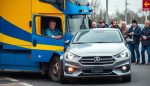 demanda por accidente de camion por vehiculo de empresa de reparto en colision